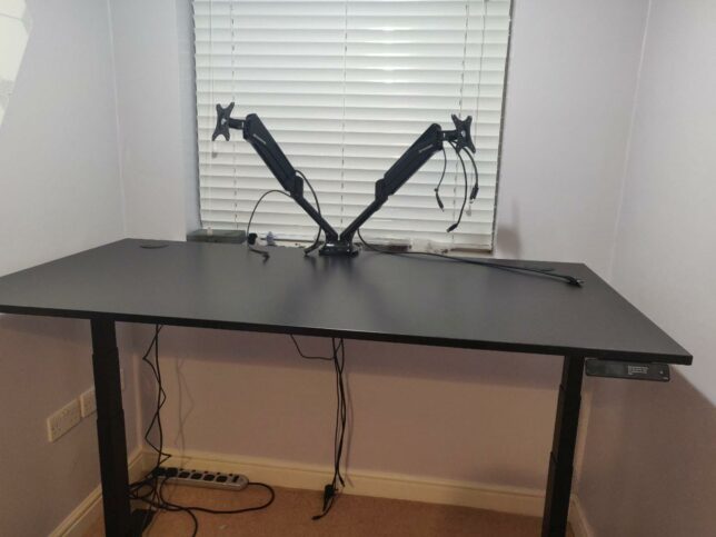 the monitor dual mount setup on the desk